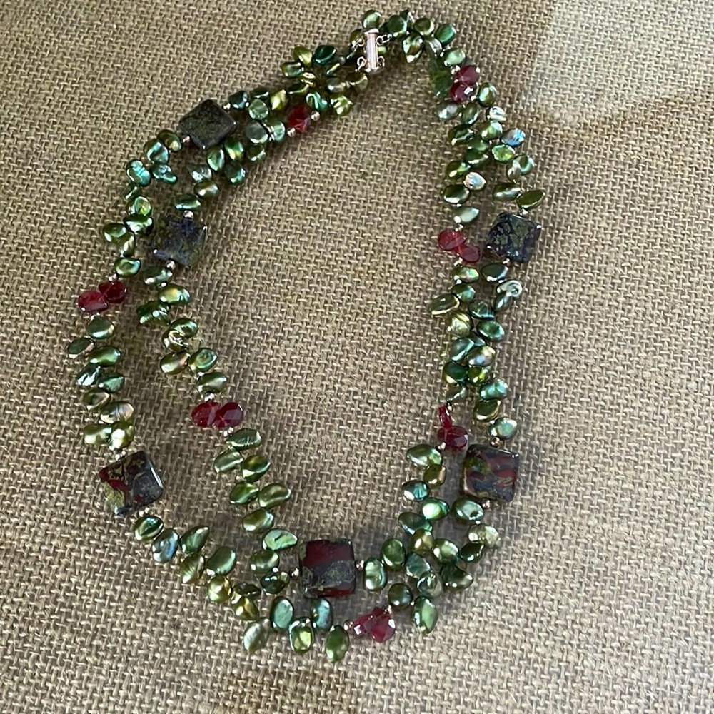 Beaded necklace in deep hues of burgundy and green